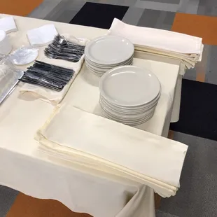 Nice metal utensils and plates. Even threw in the tablecloth for us as well.
