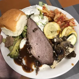 My plate of food. Roast beef was also part of our menu. *Disclaimer: The brocolli &quot;beef&quot; is not part of their menu. It&apos;s a Vegan Dish.