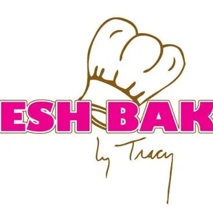 a hand holding a doughnut