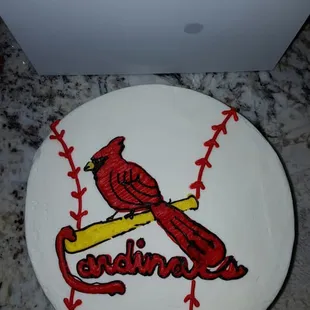 a cake with a cardinal on it