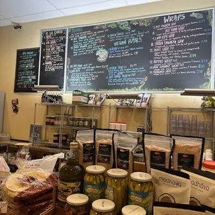 a counter with a variety of food items