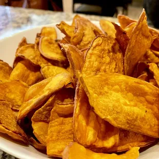 House made Coconut Potato Chips - Thinly sliced seasonal potato, fried in coconut oil, and topped with Himalayan salt.   A MUST TRY !!