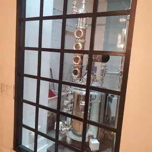 a view of a brewery through a window