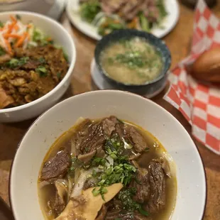 a variety of asian food on a table
