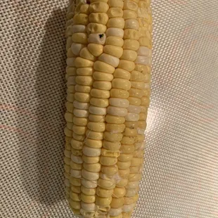 Sad little cob of corn I am supposed to grill then cut the kernels off of.  Hard when I don't have a grill plate.