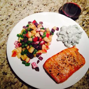 Salmon with dill cucumber and veggie salad