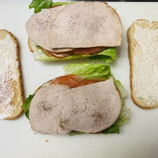Turkeys sandwich   Lettuce  tomato  onion   Mayonnaise and turkeys 3 slices
