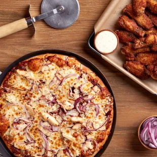a pizza and chicken wings