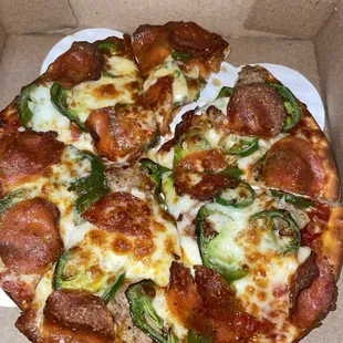 Create your own person jalapeño, pepperoni , sausage, and mushroom!