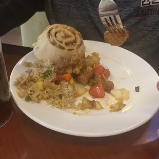 Cinnamon roll, fried rice, orange chicken