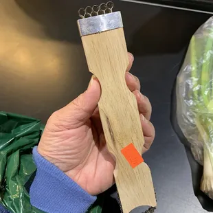 12/23/22 Ah yes! It's an implement that make coconut ribbons/strings