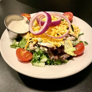 Side salad with creamy garlic dressing