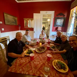 Kathy back in the kitchen cleaning up