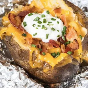 Our loaded baked potato with chopped brisket or season taco meat