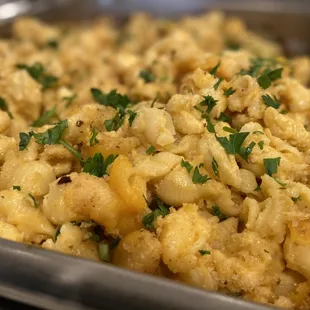 a close up of a dish of macaroni and cheese