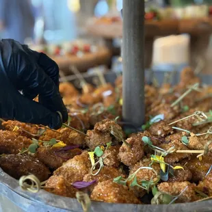 a bucket full of fried food