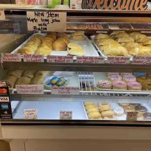 a display case full of doughnuts