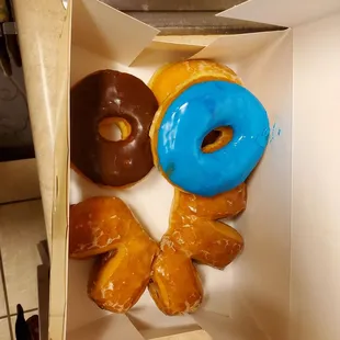 a variety of doughnuts in a box