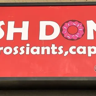 a sign for a coffee shop