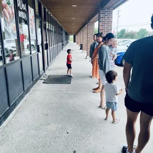 I love watching the little people eyeing the donuts in the case!