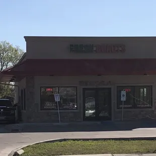 a car parked in front of the store