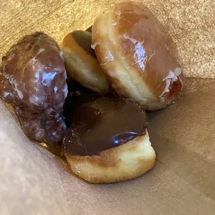 Apple fritter, Boston cream, chocolate twist, raspberry-filled