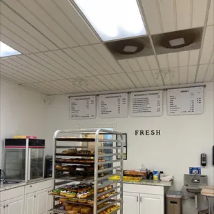a display of fresh donuts in a bakery