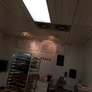 a display of fresh donuts in a bakery