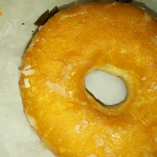 A hair covered with glaze and everything. And the bad thing is I found two Donuts like this. Very disappointed and disgusted