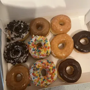 Glazed, chocolate, glazed, maple, glazed, cookies, and cream, fruity pebbles as well.