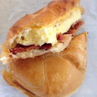 Croissant egg, bacon and cheese sandwich.