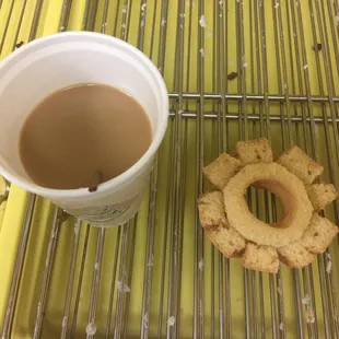 a cup of coffee and a cookie