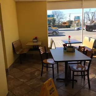 a table and chairs in a restaurant