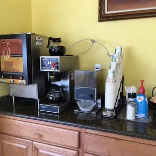a coffee machine and other items on a counter
