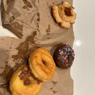 a bag of doughnuts on a table