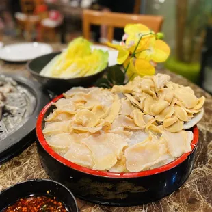 a bowl of pasta and other dishes