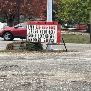 Signage with their phone number (for this location)