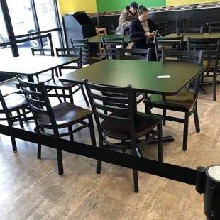 Seating area clean also they have a sectioned off waiting in line area to the right