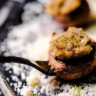 Stuffed Mushrooms are delicious and served on adorable little forks.