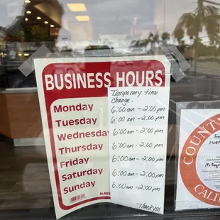 a business hours sign