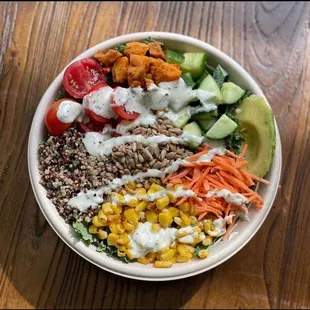 a bowl of salad with dressing