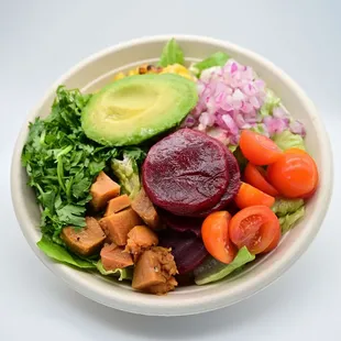 a bowl of vegetables and meat
