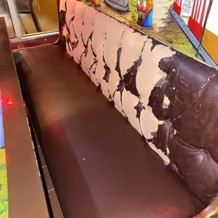 Booth Upholstery is ridiculously worn and needs replacement or repair