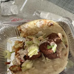 Ordered a falafel place and this is what I got for $13