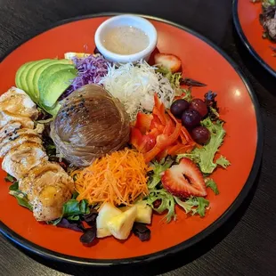 Teriyaki chicken lunch plate on salad with noodles and almond ginger dressing.  EXCELLENT!