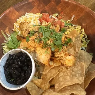 Chicken taco salad with beans on the side