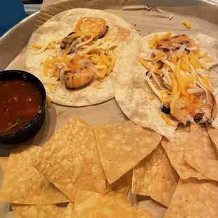 Shrimp tacos. All dishes comes with a side of their delicious salsa and chips.