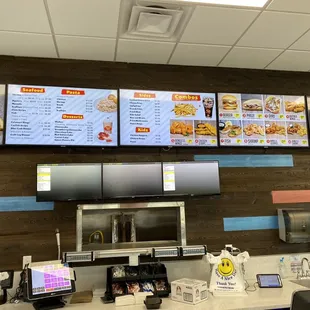menus on the wall of a fast food restaurant