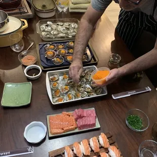 Scallops, fatty salmon and blue fin. Delicious oysters with masago.