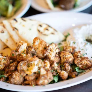Organic Fried Cauliflower. Served w/pita and tzatziki
